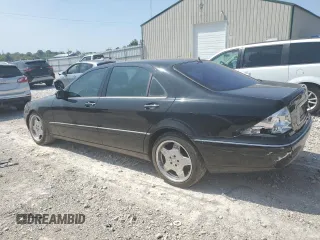 2001 Mercedes-Benz S-Class with VIN WDBNG70J51A197809, listed as a Copart auction lot 68633494 with 145,040 mi miles and Salvage Title. Bid and sale history available at carsss.com. Image 2.
