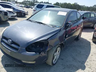 2007 Hyundai Accent SE z VIN KMHCN36C27U050012, wystawiony jako IAAI lot #42112316 z przebiegiem 172 070 mil mil oraz . Historia ofert i sprzedaży dostępna na DreamBid. Obrazek 2.