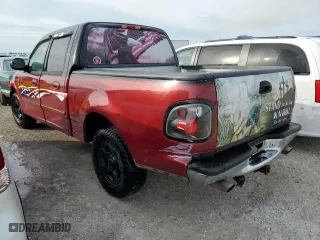 2001 Ford F-150 SuperCrew XLT with VIN 1FTRW07W21KD73871, listed as a Copart auction lot 77952474 with 0 mi miles and Salvage Title. Bid and sale history available at carsss.com. Image 2.