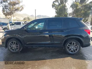 2022 Honda Passport EX-L with VIN 5FNYF7H58NB003344, listed as a IAAI auction lot 41986557 with 37,572 mi miles and . Bid and sale history available at carsss.com. Image 14.