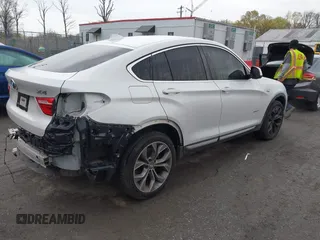2018 BMW X4 xDrive28i z VIN 5UXXW3C57J0T82081, wystawiony jako IAAI lot #41991254 z przebiegiem 100 654 mil mil oraz . Historia ofert i sprzedaży dostępna na DreamBid. Obrazek 4.