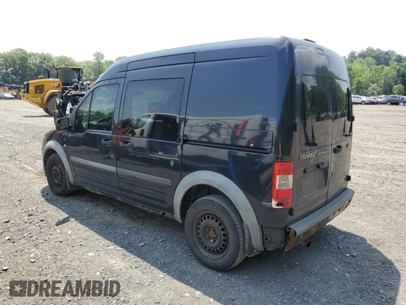2010 Ford Transit Connect XLT with VIN NM0KS9BN2AT027939, listed as a Copart auction lot 62100305 with 294,080 mi miles and Salvage title. Bid and sale history available at DreamBid. Image 2.