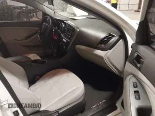2015 Kia Optima LX z VIN 5XXGM4A72FG488753, wystawiony jako IAAI lot #39163213 z przebiegiem 128 821 mil mil oraz . Historia ofert i sprzedaży dostępna na DreamBid. Obrazek 5.