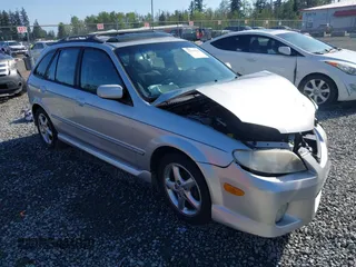 2002 Mazda Protege z VIN JM1BJ246221493337, wystawiony jako IAAI lot #42171966 z przebiegiem 244 609 mil mil oraz . Historia ofert i sprzedaży dostępna na DreamBid. Obrazek 1.