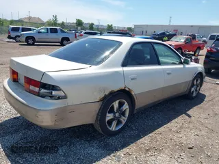 1999 Lexus ES 300 z VIN JT8BF28G9X5063095, wystawiony jako IAAI lot #42564898 z przebiegiem 209 239 mil mil oraz . Historia ofert i sprzedaży dostępna na DreamBid. Obrazek 4.