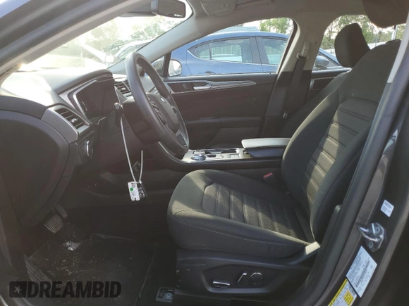 2020 Ford Fusion SE with VIN 3FA6P0HD0LR184251, listed as a Copart auction lot 57325205 with 99,142 mi miles and Salvage title. Bid and sale history available at DreamBid. Image 7.