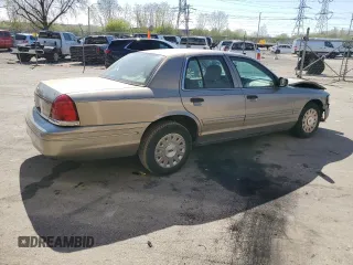 2004 Ford Crown Victoria Standard с VIN 2FAFP73W84X162132, выставлен на аукционе Copart как лот 51967594 с пробегом 227 410 миль миль и Списание • Salvage title. История ставок и продаж доступна на DreamBid. Изображение 3.