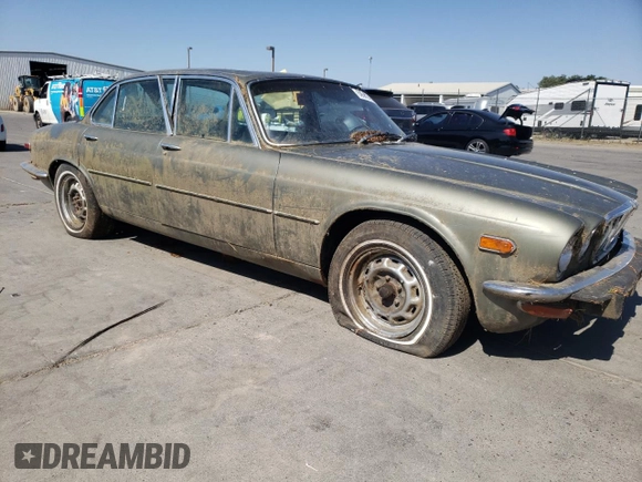 1974 Jaguar XJ with VIN UE2T52398, listed as a Copart auction lot 59589415 with 93,740 mi miles and Clean title. Bid and sale history available at DreamBid. Image 4.