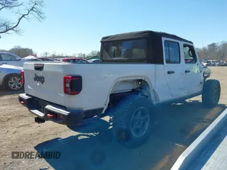 2020 Jeep Gladiator Rubicon with VIN 1C6JJTBG1LL181875, listed as a IAAI auction lot 41722037 with 51,037 mi miles and . Bid and sale history available at DreamBid. Image 14.
