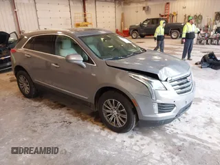 2018 Cadillac XT5 Luxury FWD with VIN 1GYKNCRS0JZ127774, listed as a IAAI auction lot 42364622 with 64,865 mi miles and . Bid and sale history available at DreamBid. Image 1.