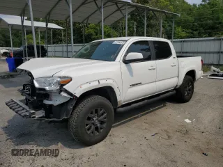 2020 Toyota Tacoma SR5 with VIN 5TFAZ5CN3LX090657, listed as a Copart auction lot 57184175 with 69,431 mi miles and Salvage title. Bid and sale history available at DreamBid. Image 1.