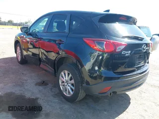 2016 Mazda CX-5 Touring z VIN JM3KE4CY2G0656270, wystawiony jako IAAI lot #42344489 z przebiegiem 60 449 mil mil oraz . Historia ofert i sprzedaży dostępna na DreamBid. Obrazek 3.