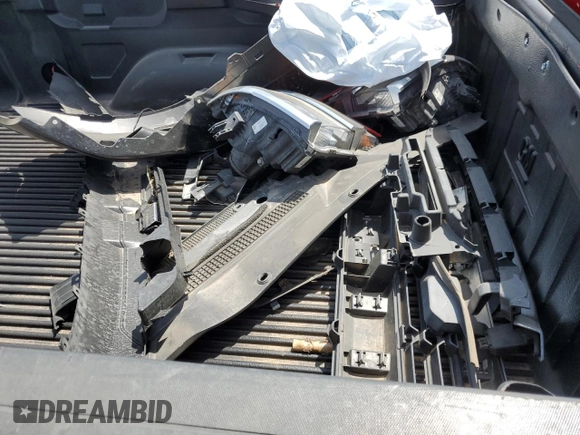 2016 Chevrolet Silverado 1500 LT with VIN 1GCRCREC0GZ197425, listed as a Copart auction lot 65031304 with 122,605 mi miles and Salvage Title. Bid and sale history available at DreamBid. Image 14.