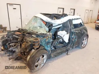 2004 MINI Hardtop with VIN WMWRC33494TC55068, listed as a IAAI auction lot 42057372 with Not provided miles and . Bid and sale history available at DreamBid. Image 17.