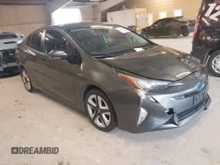 2017 Toyota Prius Two z VIN JTDKARFU7H3041322, wystawiony jako IAAI lot #42358306 z przebiegiem 98 735 mil mil oraz . Historia ofert i sprzedaży dostępna na DreamBid. Obrazek 1.