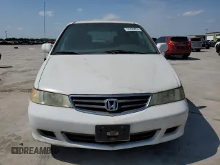 2004 Honda Odyssey EX-L with VIN 5FNRL18974B092979, listed as a Copart auction lot 52429055 with 106,515 mi miles and Clean Title. Bid and sale history available at DreamBid. Image 5.