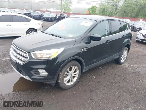2017 Ford Escape SE with VIN 1FMCU9GD3HUD90154, listed as a IAAI auction lot 42181078 with 106,143 mi miles and . Bid and sale history available at DreamBid. Image 2.
