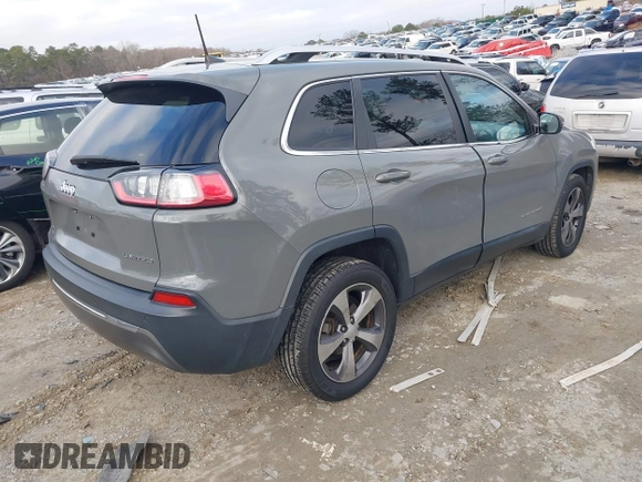 2020 Jeep Cherokee Limited with VIN 1C4PJLDBXLD502858, listed as a IAAI auction lot 41148184 with 73,509 mi miles. Bid and sale history available at carsss.com. Image 4.
