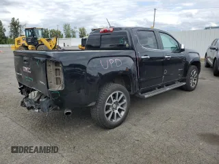 2020 GMC Canyon 4WD Denali with VIN 1GTG6EEN0L1243031, listed as a Copart auction lot 67939014 with 106,294 mi miles and Salvage Title. Bid and sale history available at carsss.com. Image 3.
