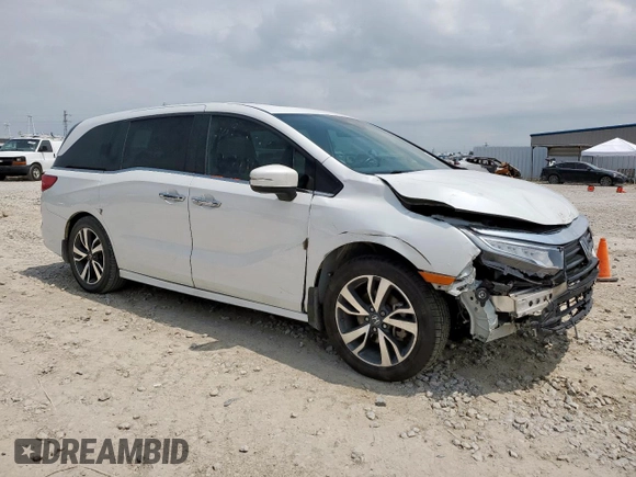 2023 Honda Odyssey Touring с VIN 5FNRL6H8XPB001311, выставлен на аукционе Copart как лот 56924345 с пробегом 77 736 миль миль и Списание • Salvage title. История ставок и продаж доступна на DreamBid. Изображение 4.
