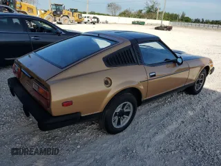 1980 Datsun 280ZX z VIN HS130221335, wystawiony jako Copart lot #81964444 z przebiegiem 135 266 mil mil oraz Szkody całkowita. Historia ofert i sprzedaży dostępna na DreamBid. Obrazek 3.