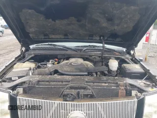 2003 Cadillac Escalade z VIN 1GYEK63N13R140496, wystawiony jako IAAI lot #42366303 z przebiegiem 90 940 mil mil oraz . Historia ofert i sprzedaży dostępna na DreamBid. Obrazek 10.