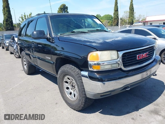 2002 GMC Yukon SLT with VIN 1GKEC13T92R162978, listed as a IAAI auction lot 41851599 with 213,789 mi miles. Bid and sale history available at carsss.com. Image 1.