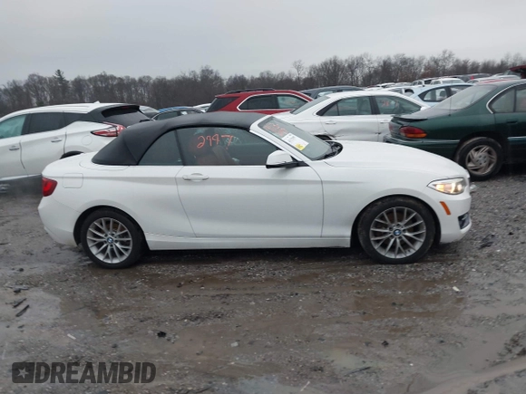 2016 BMW 2 Series 228i xDrive with VIN WBA1L9C59GV767802, listed as a IAAI auction lot 41132997 with 87,674 mi miles. Bid and sale history available at carsss.com. Image 12.