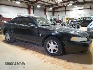 1999 Ford Mustang z VIN 1FAFP4048XF234576, wystawiony jako Copart lot #41871305 z przebiegiem 164 301 mil mil oraz Szkoda całkowita • Salvage title. Historia ofert i sprzedaży dostępna na DreamBid. Obrazek 4.