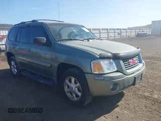 2003 GMC Envoy SLT with VIN 1GKDT13S932373739, listed as a IAAI auction lot 42122017 with 155,963 mi miles. Bid and sale history available at carsss.com. Image 1.