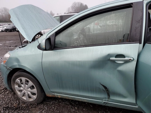 2007 Toyota Yaris with VIN JTDBT903X71056577, listed as a Copart auction lot 84511214 with 162,749 mi miles and Salvage Title. Bid and sale history available at carsss.com. Image 7.