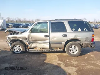 2003 Chevrolet Tahoe LS with VIN 1GNEK13V03J154985, listed as a IAAI auction lot 41708954 with 203,826 mi miles and . Bid and sale history available at DreamBid. Image 14.