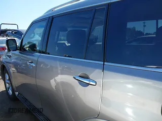 2011 Infiniti QX56 7-passenger with VIN JN8AZ2NE2B9001082, listed as a IAAI auction lot 42099158 with 219,685 mi miles and . Bid and sale history available at DreamBid. Image 14.