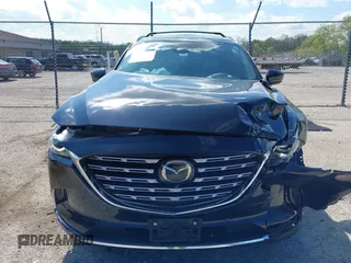 2021 Mazda CX-9 Signature with VIN JM3TCBEY1M0539786, listed as a IAAI auction lot 42264611 with 51,168 mi miles and . Bid and sale history available at DreamBid. Image 12.