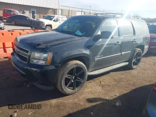 2008 Chevrolet Tahoe 3LT with VIN 1GNFC13J68R156148, listed as a IAAI auction lot 41607340 with 154,533 mi miles and . Bid and sale history available at DreamBid. Image 2.
