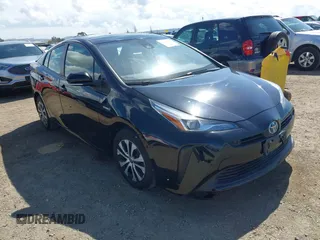 2021 Toyota Prius L Eco with VIN JTDKAMFU6M3135799, listed as a IAAI auction lot 42064241 with 77,120 mi miles and . Bid and sale history available at DreamBid. Image 1.