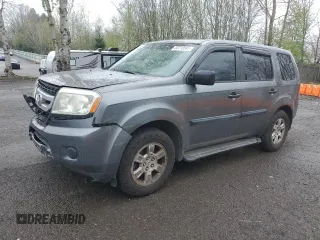 2011 Honda Pilot LX with VIN 5FNYF3H25BB027885, listed as a Copart auction lot 52210585 with 195,556 mi miles and Salvage title. Bid and sale history available at DreamBid. Image 1.