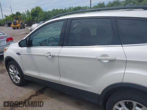 2013 Ford Escape SEL with VIN 1FMCU9H90DUC52981, listed as a IAAI auction lot 42506500 with 74,212 mi miles and . Bid and sale history available at DreamBid. Image 14.