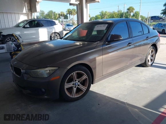2013 BMW 3 Series 320i with VIN WBA3B1C54DK129838, listed as a IAAI auction lot 42752788 with 95,262 mi miles and . Bid and sale history available at DreamBid. Image 2.