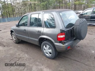 2001 Kia Sportage with VIN KNDJB723515095478, listed as a IAAI auction lot 41823976 with 185,652 mi miles. Bid and sale history available at carsss.com. Image 3.
