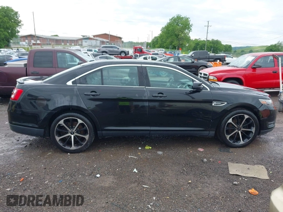 2015 Ford Taurus SEL z VIN 1FAHP2E81FG116032, wystawiony jako IAAI lot #42188269 z przebiegiem 178 774 mil mil oraz . Historia ofert i sprzedaży dostępna na DreamBid. Obrazek 13.