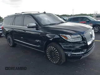 2019 Lincoln Navigator Black Label with VIN 5LMJJ3TTXKEL00460, listed as a IAAI auction lot 42600107 with 75,253 mi miles and . Bid and sale history available at DreamBid. Image 1.