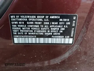 2014 Volkswagen Passat SEL Premium with VIN 1VWCS7A37EC022413, listed as a IAAI auction lot 40597042 with 131,866 mi miles. Bid and sale history available at carsss.com. Image 9.