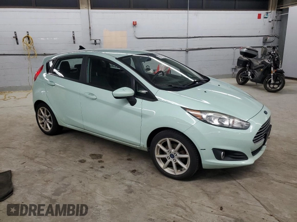 2017 Ford Fiesta SE with VIN 3FADP4EJ0HM143874, listed as a Copart auction lot 55123335 with 121,392 mi miles and Clean Title. Bid and sale history available at carsss.com. Image 4.