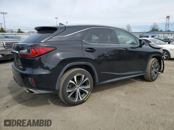 2016 Lexus RX 350 with VIN 2T2BZMCAXGC034761, listed as a Copart auction lot 49761995 with 112,862 mi miles and Salvage Title. Bid and sale history available at DreamBid. Image 3.