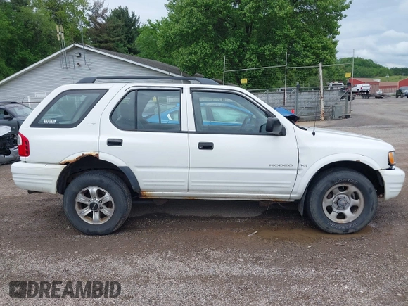 2000 Isuzu Rodeo z VIN 4S2DM58W6Y4312571, wystawiony jako IAAI lot #42253955 z przebiegiem 84 517 mil mil oraz . Historia ofert i sprzedaży dostępna na DreamBid. Obrazek 13.