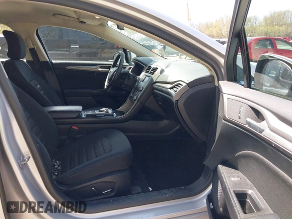 2018 Ford Fusion SE z VIN 3FA6P0H77JR226390, wystawiony jako IAAI lot #42120981 z przebiegiem 114 057 mil mil oraz . Historia ofert i sprzedaży dostępna na DreamBid. Obrazek 5.