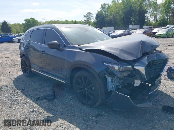 2022 Mazda CX-9 Grand Touring with VIN JM3TCBDY8N0628886, listed as a IAAI auction lot 42074044 with 67,867 mi miles and . Bid and sale history available at DreamBid. Image 1.