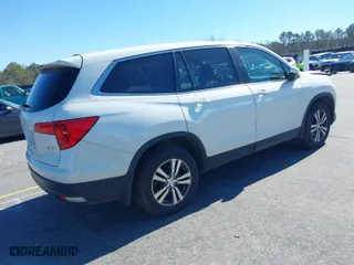 2016 Honda Pilot EX with VIN 5FNYF6H32GB078939, listed as a IAAI auction lot 41641358 with 126,138 mi miles. Bid and sale history available at carsss.com. Image 4.