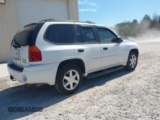 2007 GMC Envoy SLE with VIN 1GKDT13S472223365, listed as a IAAI auction lot 41690531 with 170,539 mi miles. Bid and sale history available at carsss.com. Image 4.